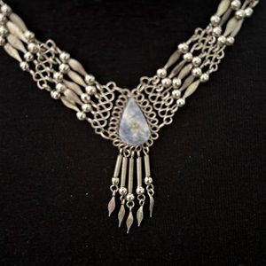 Stunning silver choker style necklace. Perfect accent piece for any outfit!